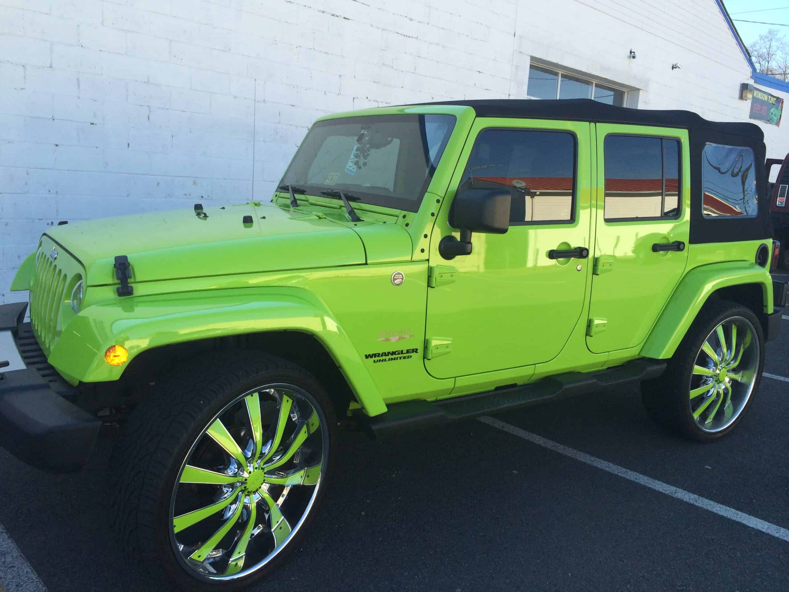 Windows tinting in a green Jeep Wrangler