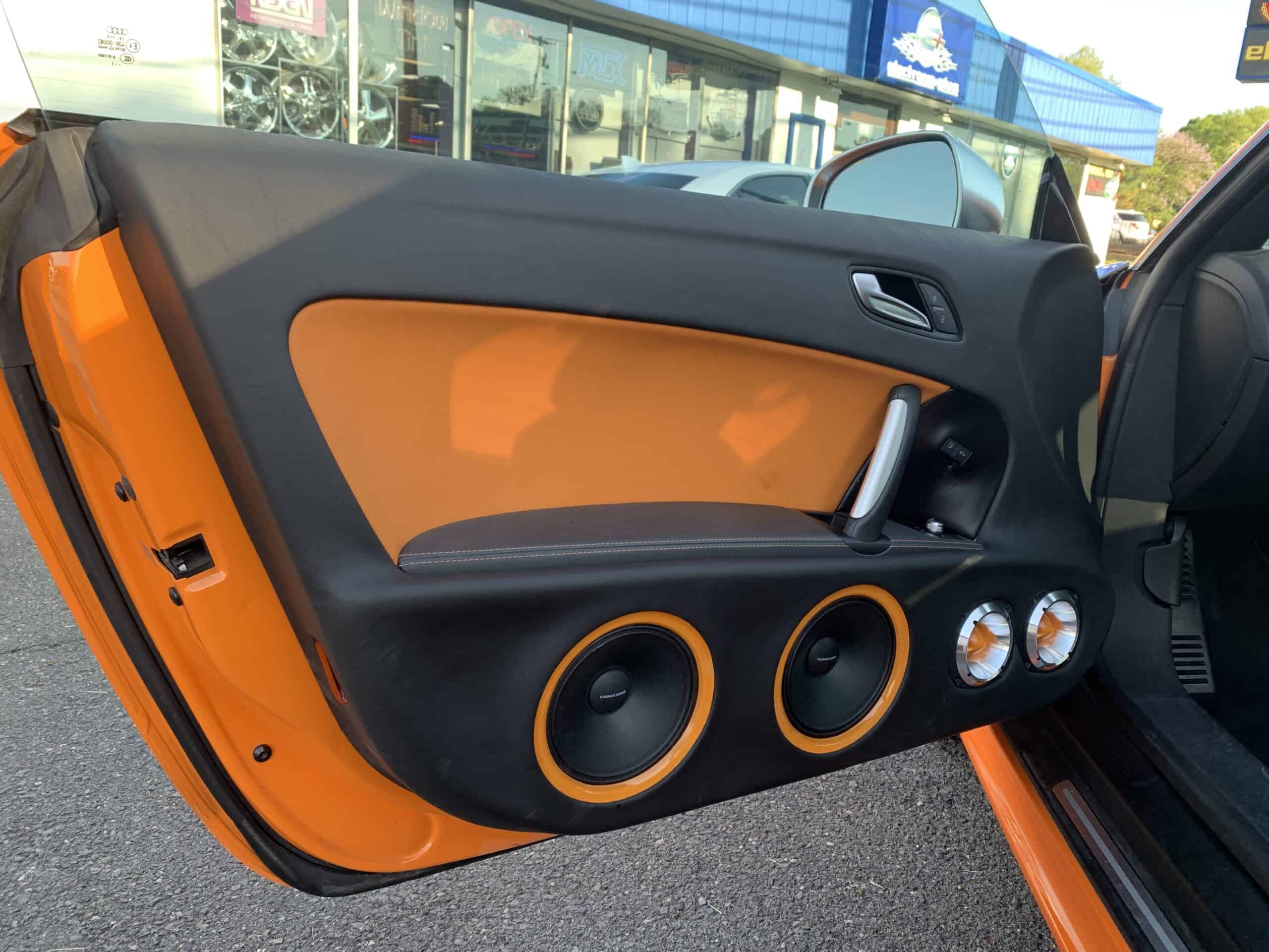 Car audio installation in a orange car